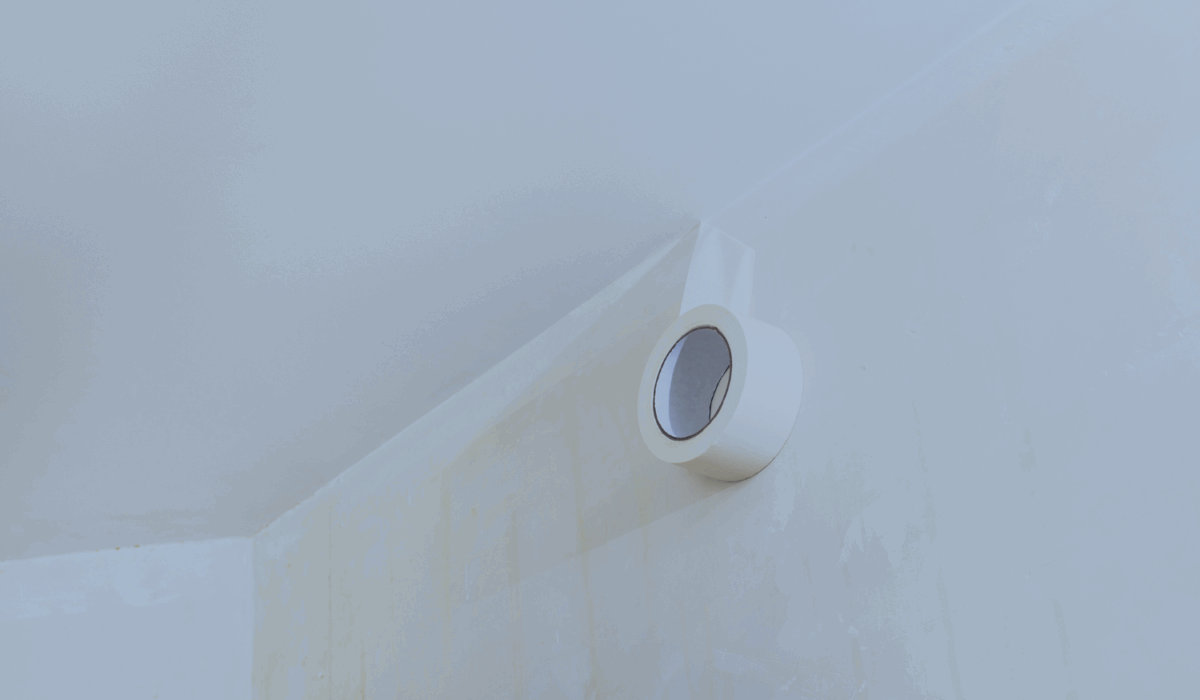 how to get adhesive off wall
