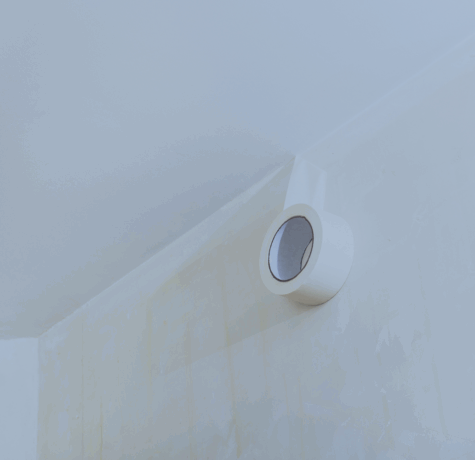 how to get adhesive off wall