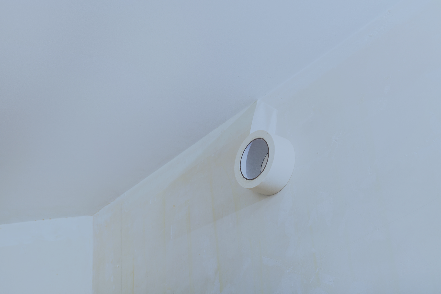 how to get adhesive off wall